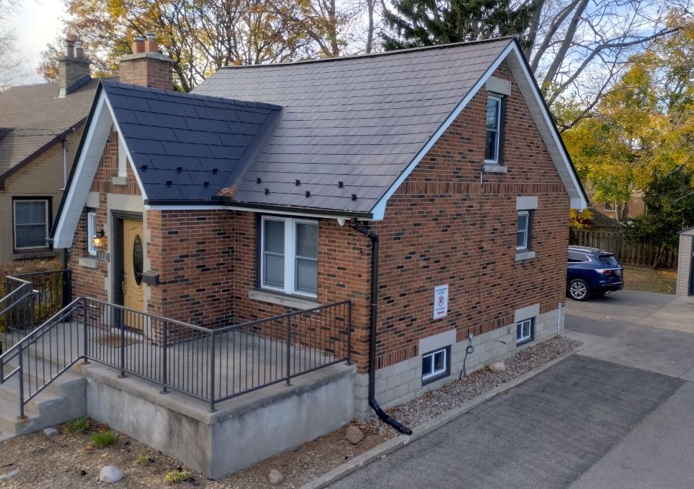 Eco-friendly roofing options including metal and energy-efficient shingles on homes in Ontario