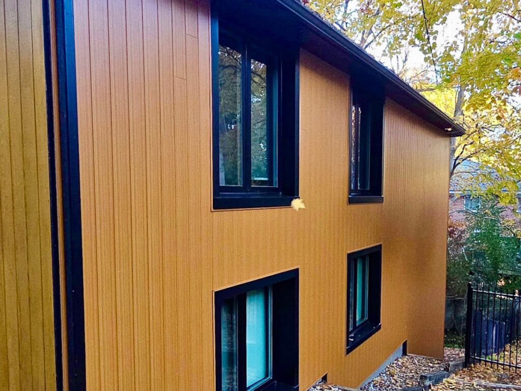 Insulated siding installation improving energy efficiency for an Ontario home
