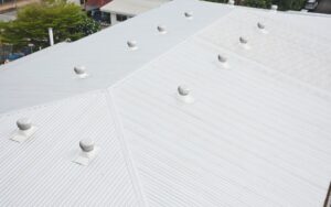 Commercial roof in Ontario inspected for lifespan, wear, and weather-related damage