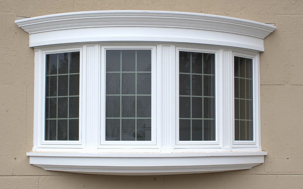Commercial bay window installation adding curb appeal to an office or storefront building by 1st Choice Home Solutions